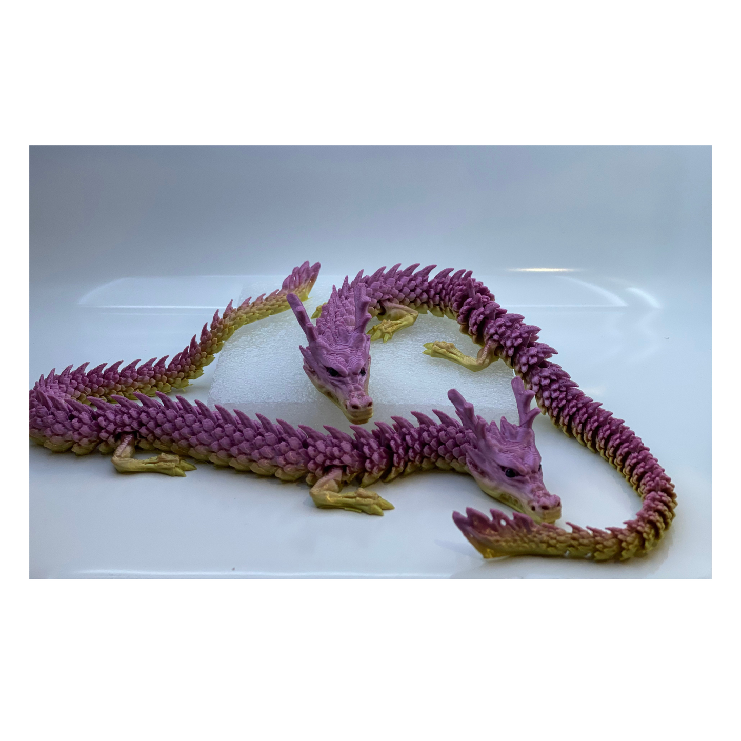 3D-Printed Articulated Dragon β Random Color
