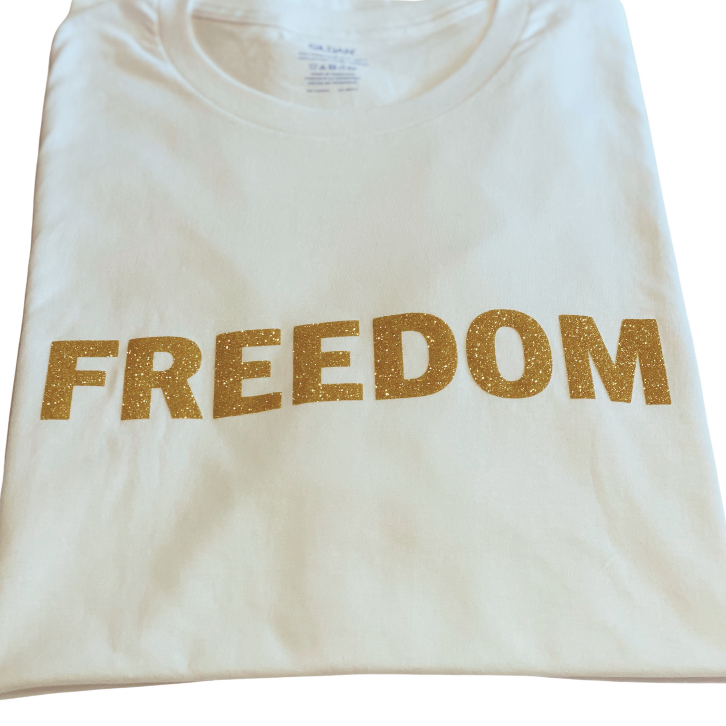 FREEDOM Gold Edition T-Shirt – White Cotton Tee with Glitter Gold Print – Limited Edition
