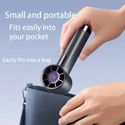 💨 Mini Handheld Cordless Fan – Pocket-Sized Power for On-the-Go Cooling!